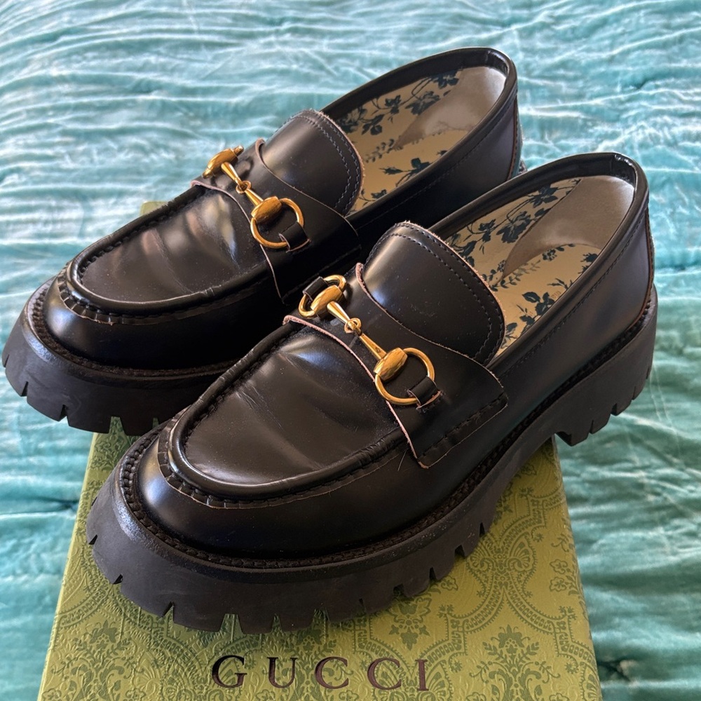 Gucci Black Leather Loafers with Gold Accents